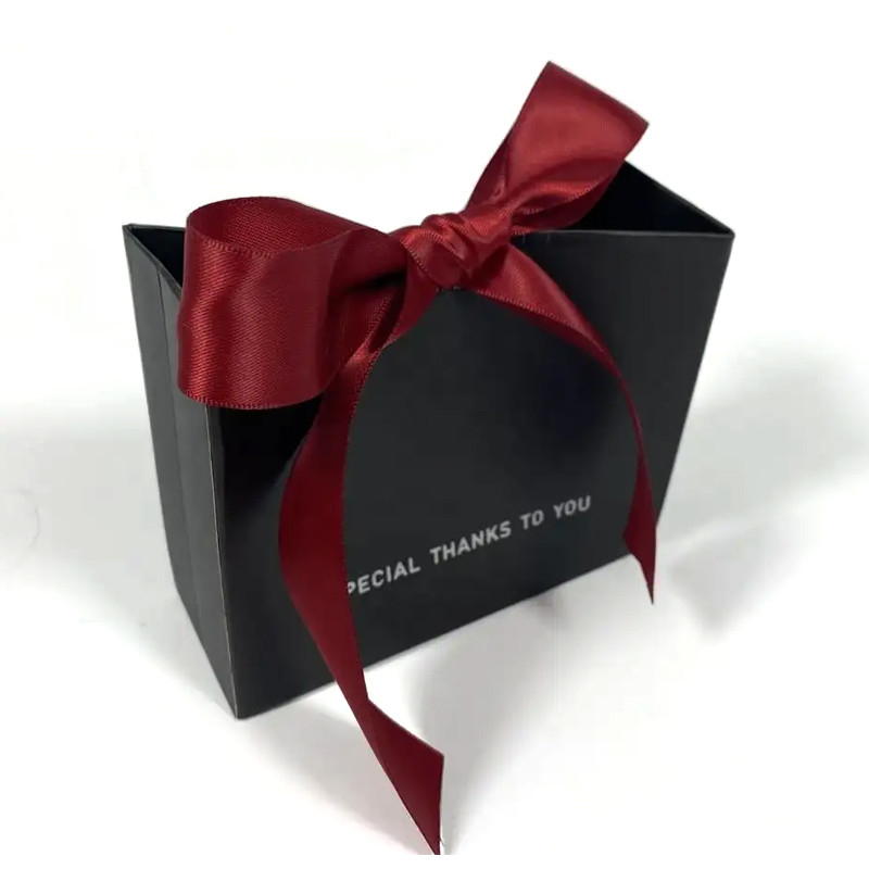 Wholesale Modern Luxury Black Die Cut Paper Bags For Clothing Perfume Jewelry Gift Shopping Custom Logo Unique Design